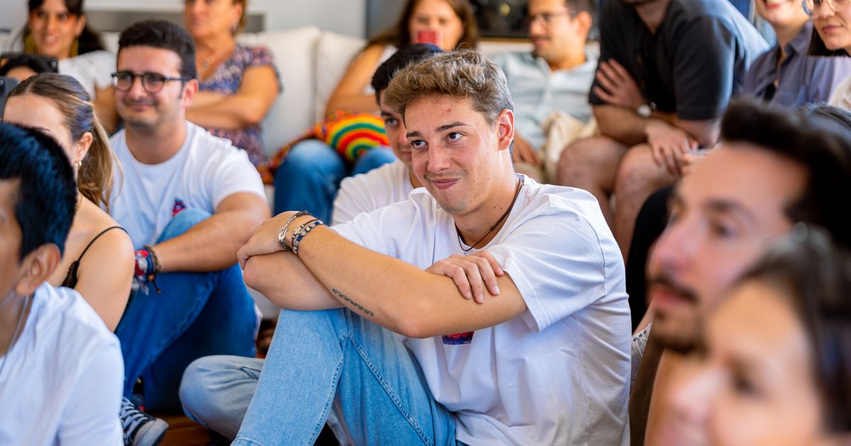 Young counsellors sitting together, listening during a training session