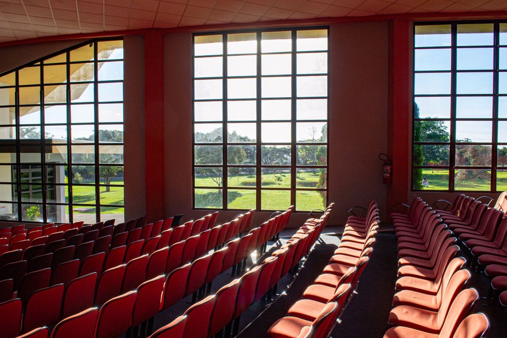 A bright hall with rows of seats