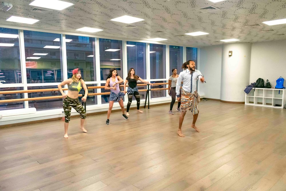 A teacher leading a jazz class