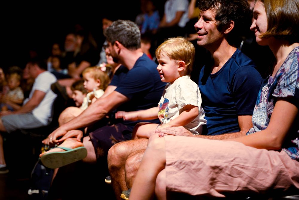 Families watching a showcase