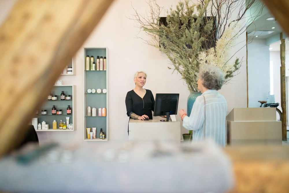 A client arriving at the front desk